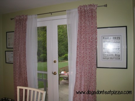 Red curtains against light green walls - thediybungalow.com