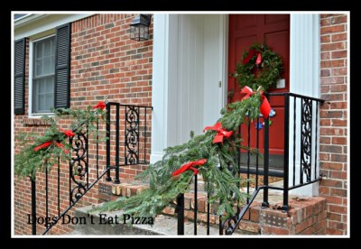 Side view of entry with garland - Dogs Don't Eat Pizza