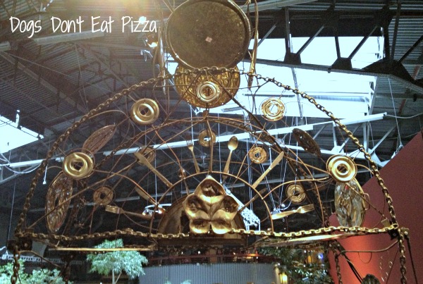 arch out of silverware and platters in the Tinkering Room - thediybungalow.com