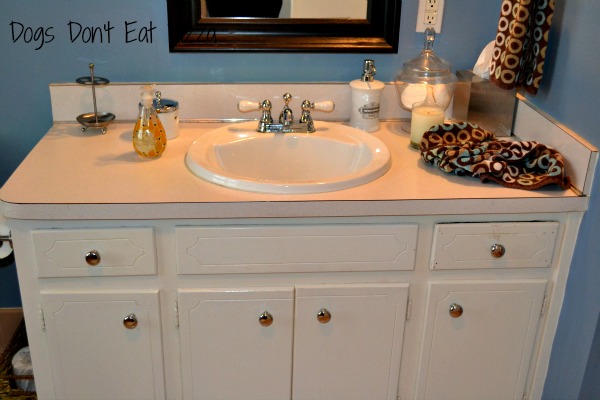 Vanity in the downstairs bathroom before - thediybungalow.com