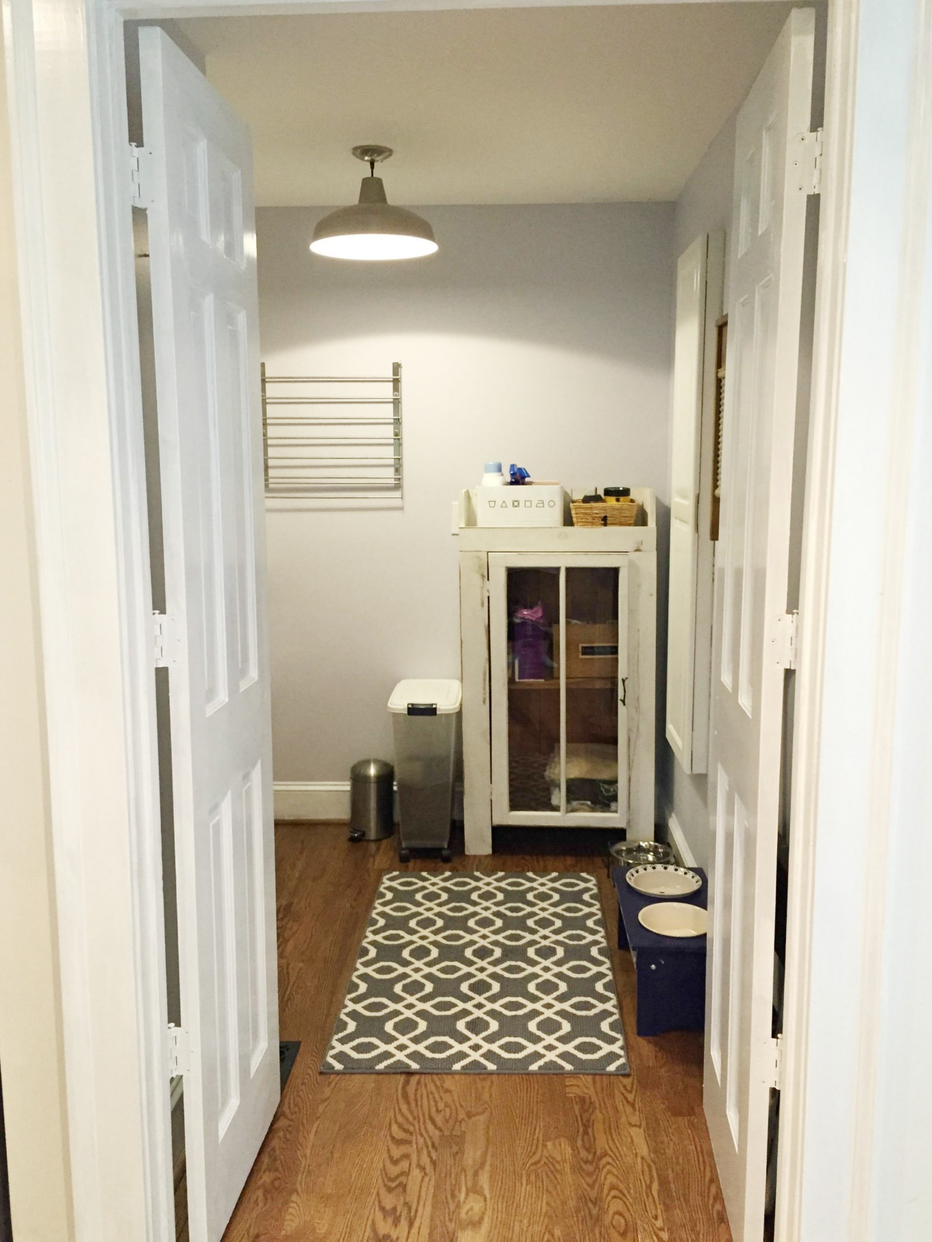 Storage cabinet in laundry room reveal - thediybungalow.com