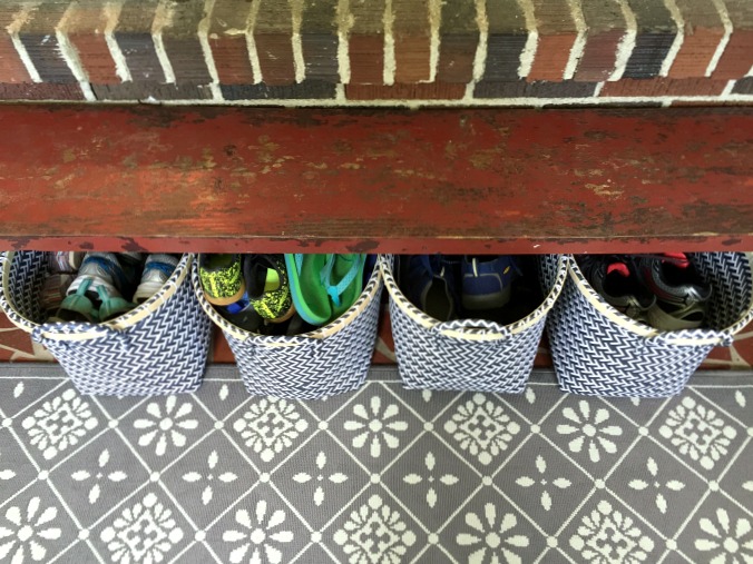 Front porch organization - shoe storage baskets - thediybungalow.com