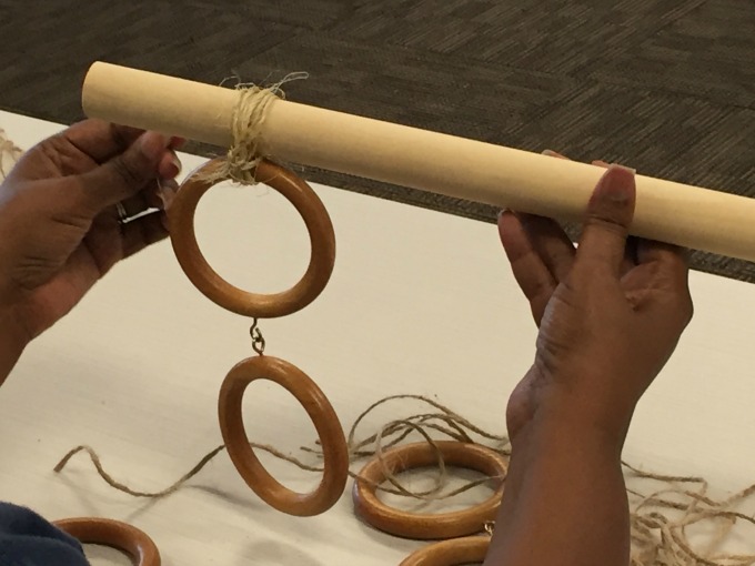 Repurposing curtain hardware - attaching rings for scarf and tie holder - thediybungalow.com