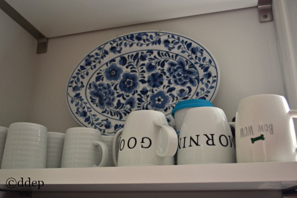 mugs on shelf in new kitchen - Dogs Don't Eat Pizza