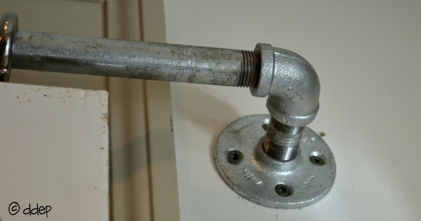 Flange attached to wall - How to Turn a Door into a Sliding Door - thediybungalow.com
