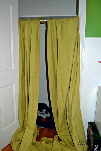 play fort made with curtains