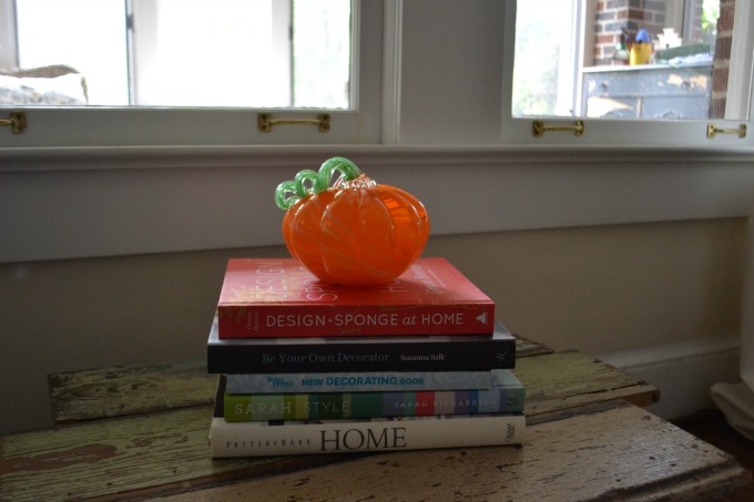 Adding pumpkins and warm colors decorating for fall - thediybungalow.com