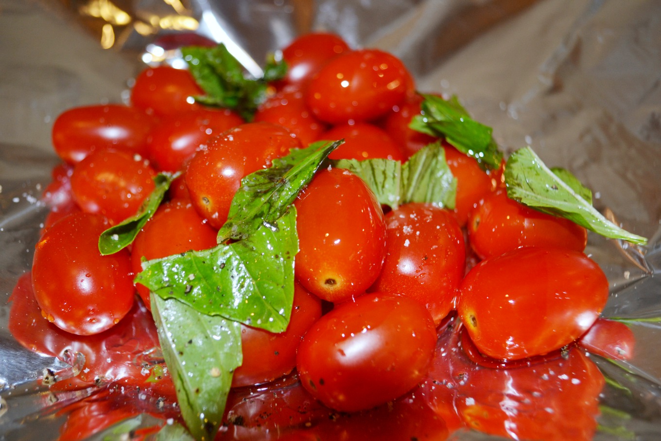 Foil packets with tomatoes, basil, and olive oil are one of my easy recipes for the grill - thediybungalow.com