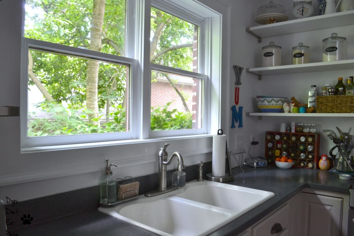 White painted trim on window brightens kitchen - painted kitchen - Dogs Don't Eat Pizza