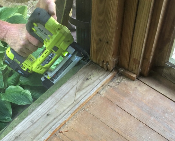 Use stapler to reattach screen when fixing screened porch - thediybungalow.com