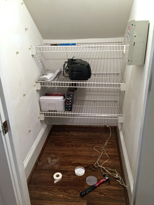 closet under the stairs before - family room tidying up - thediybungalow.com