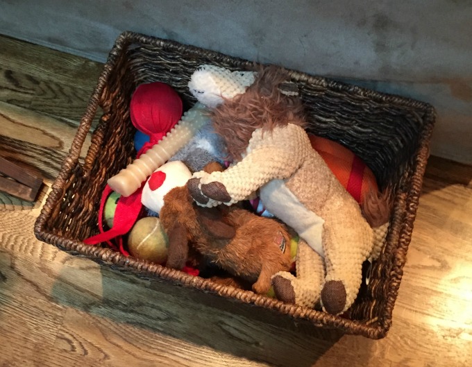 Dog toys in family room - family room tidying up - thediybungalow.com