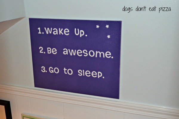 Spray paint canvas over letter stickers to make a fun sign - TheDIYBungalow.com