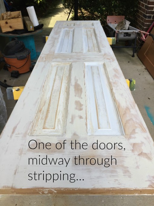 Halfway through stripping paint from six-panel door - thediybungalow.com