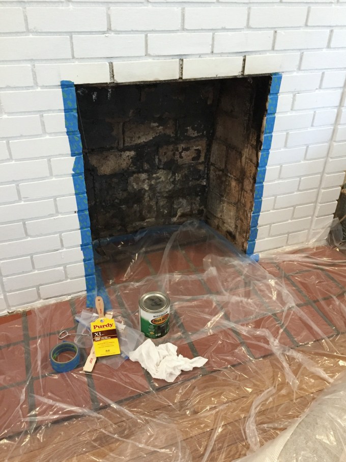 Ready to paint the newly cleaned fireplace firebox - thediybungalow.com