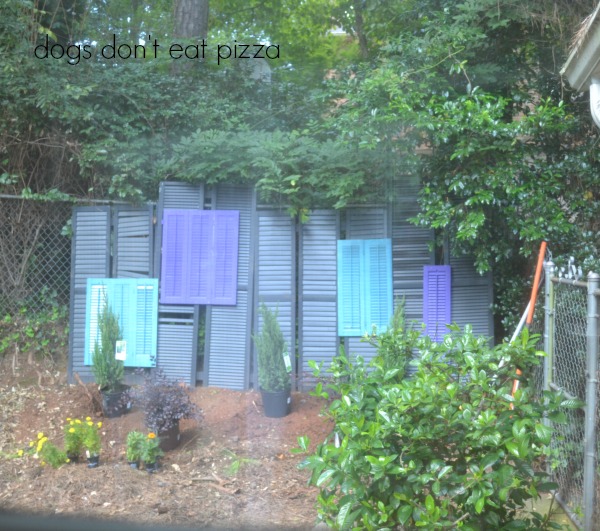 View of shutters turned into a privacy screen from our breakfast room window - thediybungalow.com