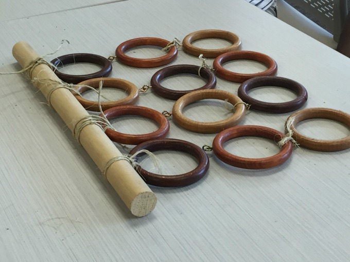 Repurposing curtain hardware - finished scarf and tie holder - thediybungalow.com