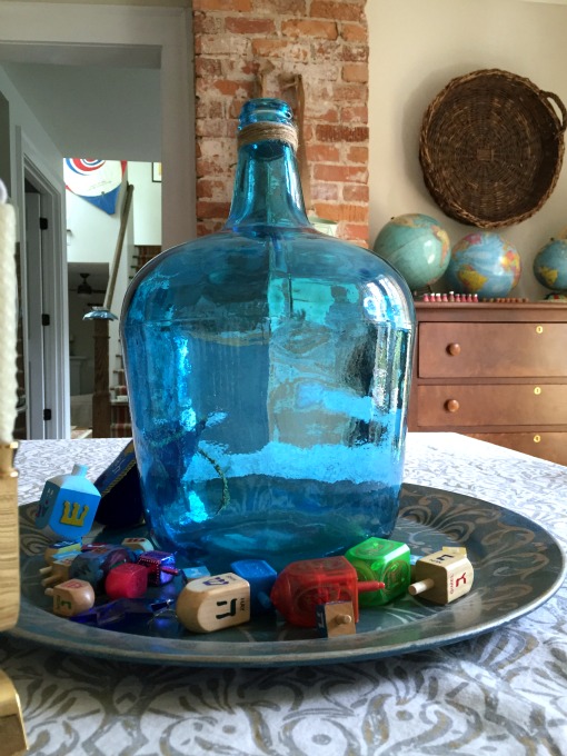 Dreidels and teal glass for Hanukkah - thediybungalow.com