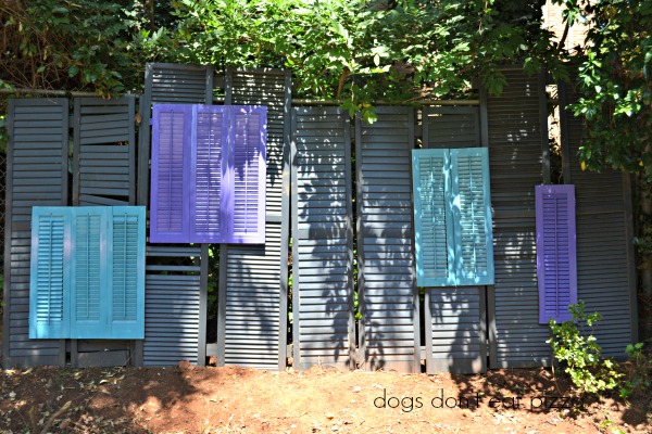 Finished shutters into a privacy screen - thediybungalow.com
