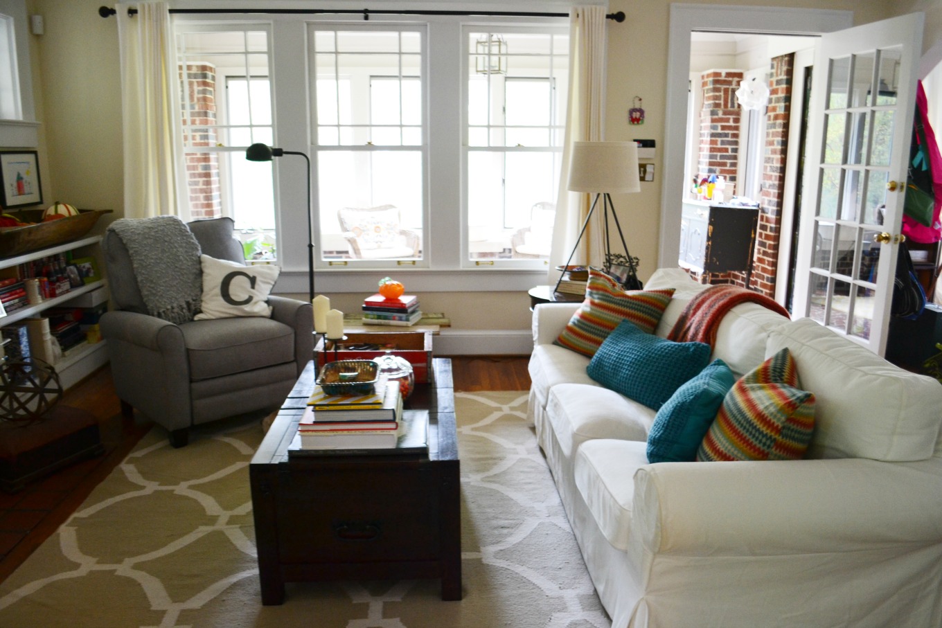 Living room before with chunky coffee table - thediybungalow.com