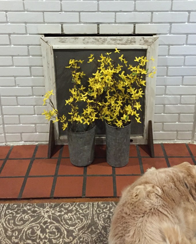 Fireplace screen on clean fireplace after fireplace makeover - thediybungalow.com