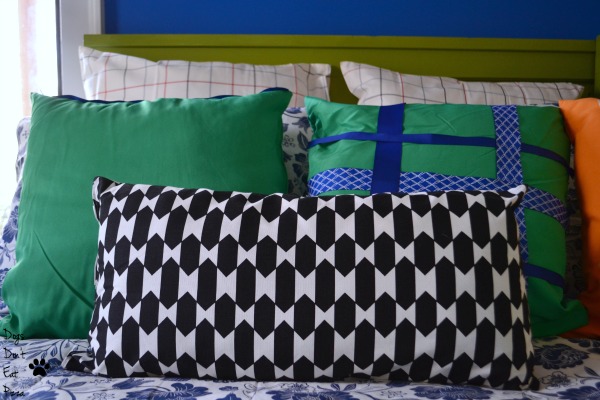 Pile the pillows on the bed to make guests extra comfy - thediybungalow.com