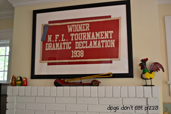 My grandmother's speech vintage banner in the living room of the 1929 House - thediybungalow.com