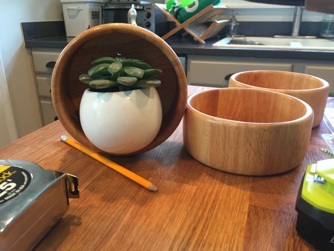 Mark planter magnet location for DIY wooden wall planter - thediybungalow.com