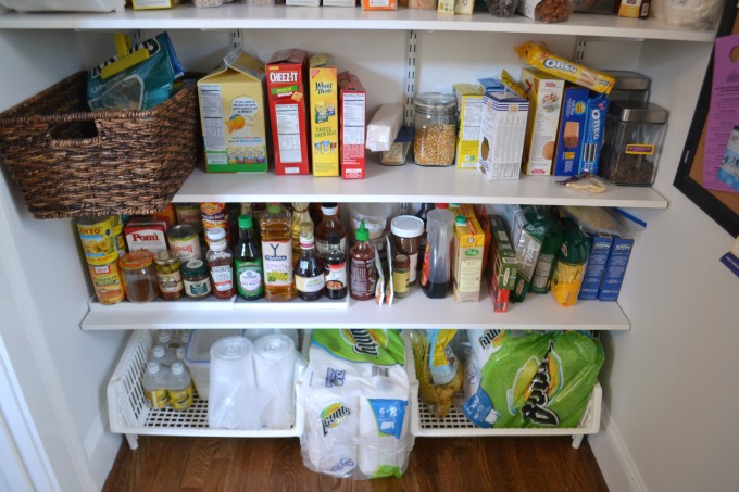 Bottom shelves of pantry for food storage - thediybungalow.com