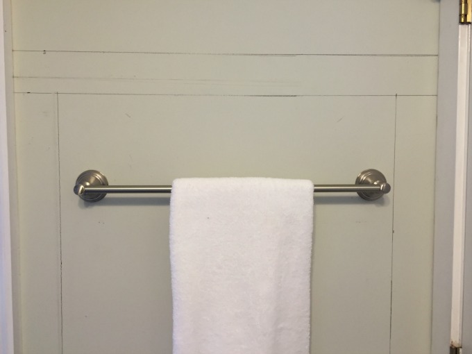 Drawing out wainscoting on guest bathroom walls - thediybungalow.com