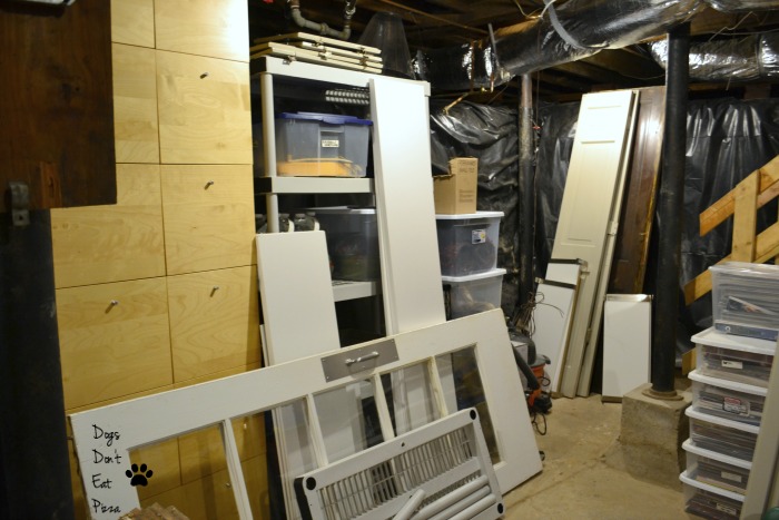 Doors and shelves storage for how to organize an unfinished basement - thediybungalow.com