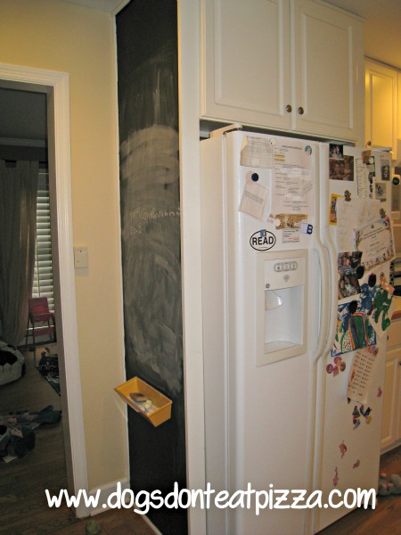 old kitchen fridge and chalkboard wall