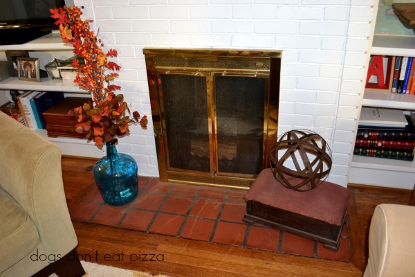 Fireplace in the living room of the 1929 House - thediybungalow.com