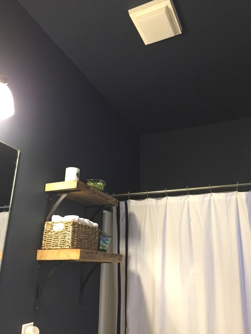 Navy blue paint on walls and ceiling - guest bathroom makeover reveal - thediybungalow.com