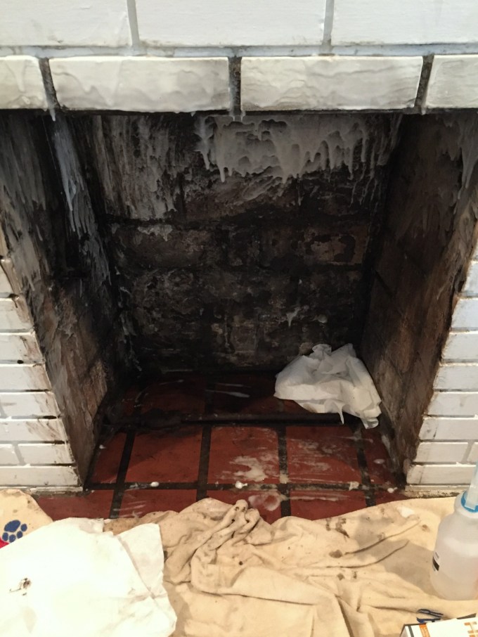 Slurry to clean fireplace firebox for fireplace makeover - thediybungalow.com