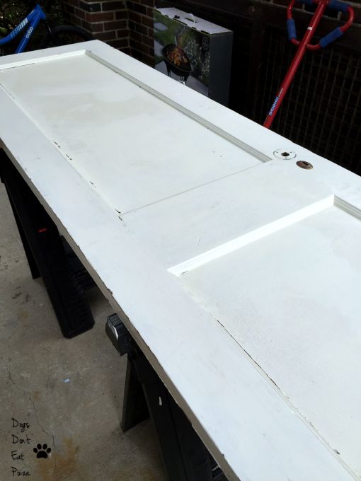 old door found at the Atlanta Habitat for Humanity ReStore - how to turn an old door into a memo board - thediybungalow.com