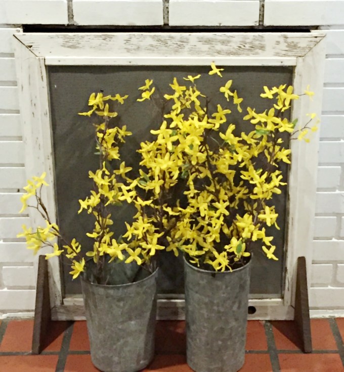 DIY fireplace screen from repurposed window screen - thediybungalow.com