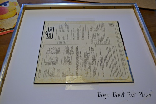 Framing Albums as Art - TheDIYBungalow.com