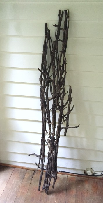 Back porch makeover - branches as art - thediybungalow.com