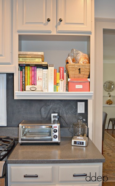 microwave shelf into cookbook storage - kitchen - thediybungalow.com