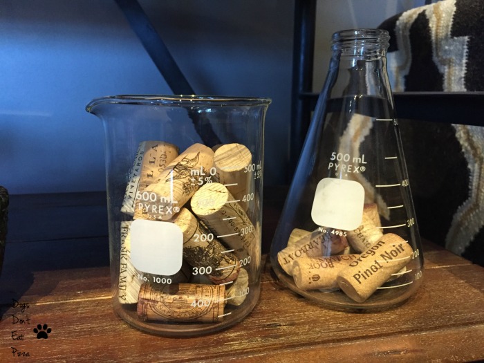 Wine corks in beakers on a bar - thediybungalow.com