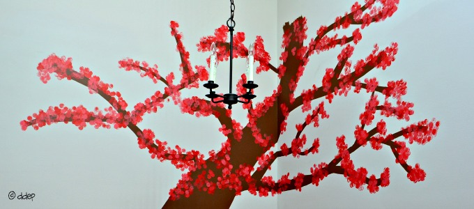 putting the flowers on the tree - breakfast room - Dogs Don't Eat Pizza