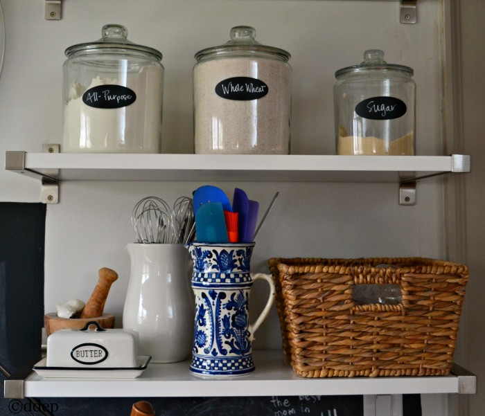 three storage jars on shelves - open shelving in the kitchen - thediybungalow.com