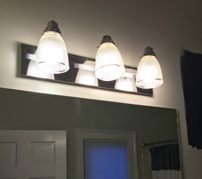 New shades on light fixture - guest bathroom makeover reveal - thediybungalow.com