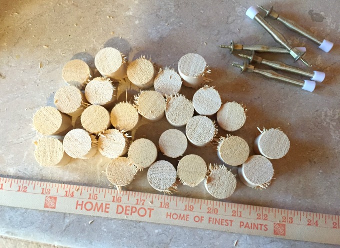 Sand the rough edges of the dowel to make a snowflake from hardware - thediybungalow.com