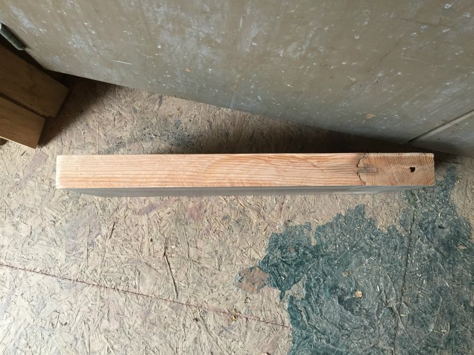 How to make reclaimed wood shelves from old door - thediybungalow.com