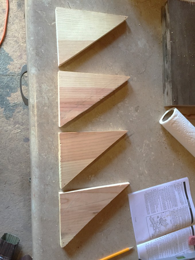 Scrap wood supports for DIY fireplace screen - thediybungalow.com