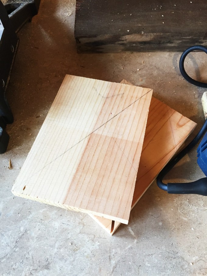 Scrap wood cut for legs of DIY fireplace screen - thediybungalow.com