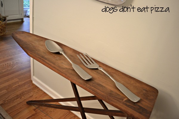 antique-wood-ironing-board-top-with-silverware - Dogs Don't Eat Pizza