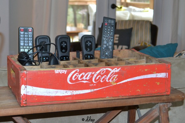 Keep remote controls under control - Five Ways to Use a Vintage Coke Crate - thediybungalow.com
